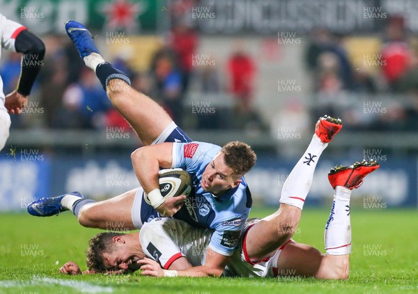 251019 - Ulster Rugby v Cardiff Blues - Guinness PRO14 -  Ulster's Billy Burns in action with Cardiff's Jason Harries 