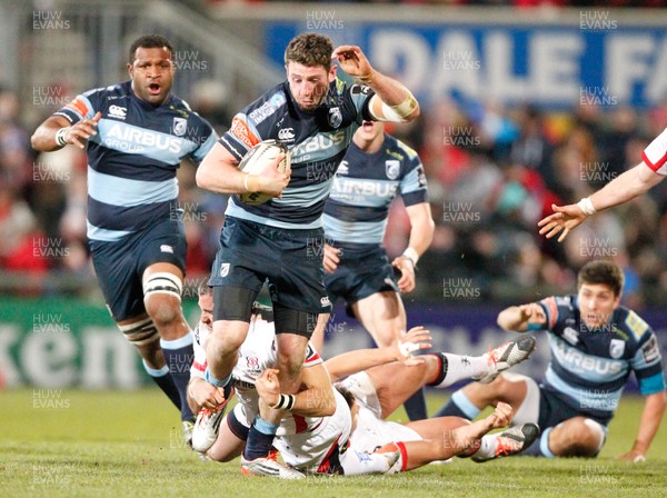 270315 - Ulster v Cardiff Blues - Guinness PRO12 -  Alex Cuthbert of Cardiff tackled by Royt Scholes of Ulster  (c) Huw Evans Agency