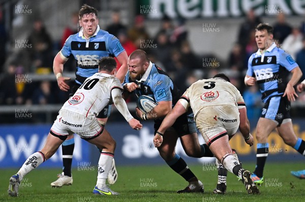 040322 - Ulster v Cardiff Rugby - United Rugby Championship - Dmitri Arhip of Cardiff is tackled by Billy Burns, left, and Marty Moore of Ulster
