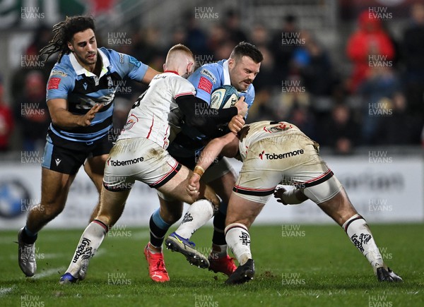 040322 - Ulster v Cardiff Rugby - United Rugby Championship - Aled Summerhill of Cardiff is tackled by Nathan Doak, left, and John Andrew of Ulster