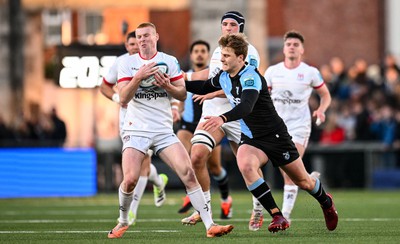 Nathan Doak of Ulster is tackled by Jacob Beetham of Cardiff