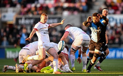 Nathan Doak of Ulster in action against Taulupe Faletau of Cardiff