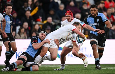 190424 - Ulster v Cardiff Rugby - United Rugby Championship - Will Addison of Ulster is tackled by Ben Donnell of Cardiff