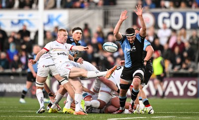 190424 - Ulster v Cardiff Rugby - United Rugby Championship - Nathan Doak of Ulster in action against Ben Donnell of Cardiff