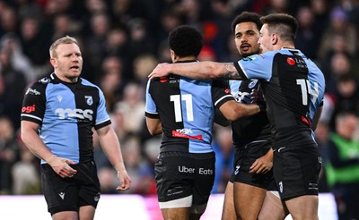 190424 - Ulster v Cardiff Rugby - United Rugby Championship - Theo Cabango of Cardiff, 11, celebrates with teammates after scoring their side's second try