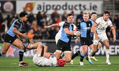 190424 - Ulster v Cardiff Rugby - United Rugby Championship - Mason Grady of Cardiff is tackled by Jude Postlethwaite of Ulster