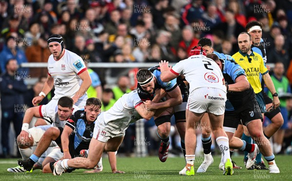 190424 - Ulster v Cardiff Rugby - United Rugby Championship - Ben Donnell of Cardiff is tackled by Jude Postlethwaite of Ulster