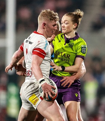 310126 - Ulster v Cardiff Rugby - United Rugby Championship - Conor McKee of Ulster and Johan Mulder of Cardiff, obstructed, collide with referee Hollie Davidson