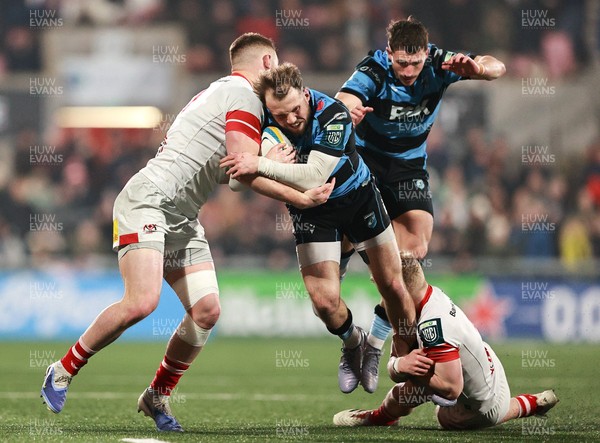 310126 - Ulster v Cardiff Rugby - United Rugby Championship - Tom Bowen of Cardiff is tackled by Ulster players, from left, Zac Ward and Conor McKee