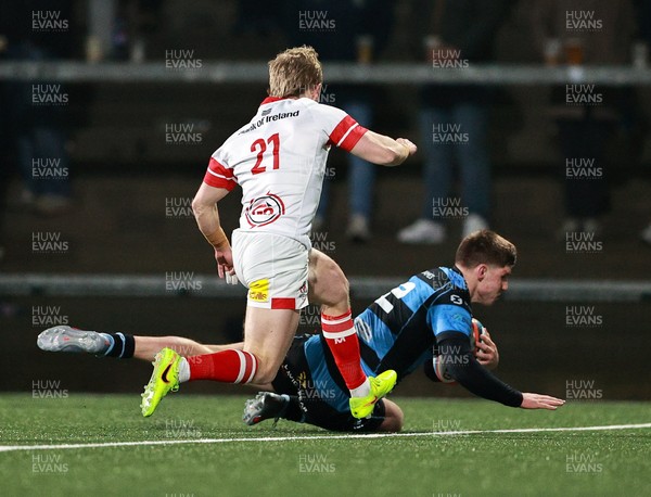 310126 - Ulster v Cardiff Rugby - United Rugby Championship - Steffan Emanuel of Cardiff on his way to scoring his side's second try despite the attention of David Shanahan of Ulster