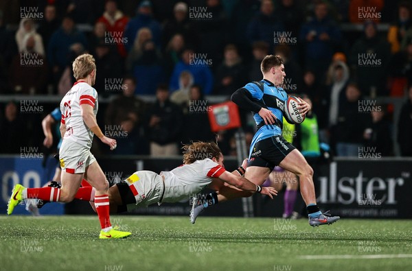 310126 - Ulster v Cardiff Rugby - United Rugby Championship - Steffan Emanuel of Cardiff on his way to scoring his side's second try despite the attention of Werner Kok of Ulster