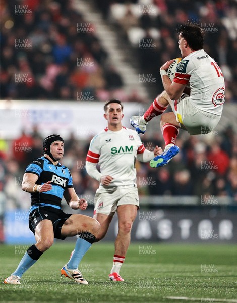 310126 - Ulster v Cardiff Rugby - United Rugby Championship - Ethan McIlroy of Ulster in action against Leigh Halfpenny of Cardiff