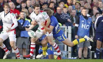 12.11.11  Ulster v Clermont Auvergne Darren Cave loses the ball in the tackle with Clermont's Aurelien Rougerie 