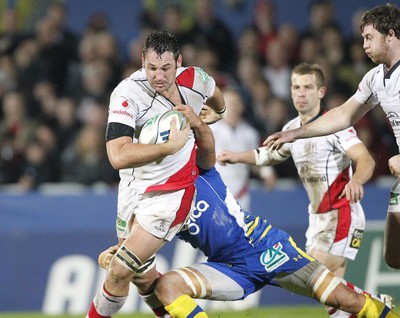 12.11.11  Ulster v Clermont Auvergne... Pedrie Wannenburg of Ulster tackled by Julien Bardy of Clermont. 