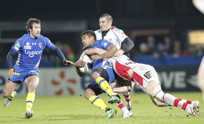 12.11.11  Ulster v Clermont Auvergne... Noa Nakaitaci of Clermont tackled by  Ian Humphreys and Stephen Ferris of Ulster. 