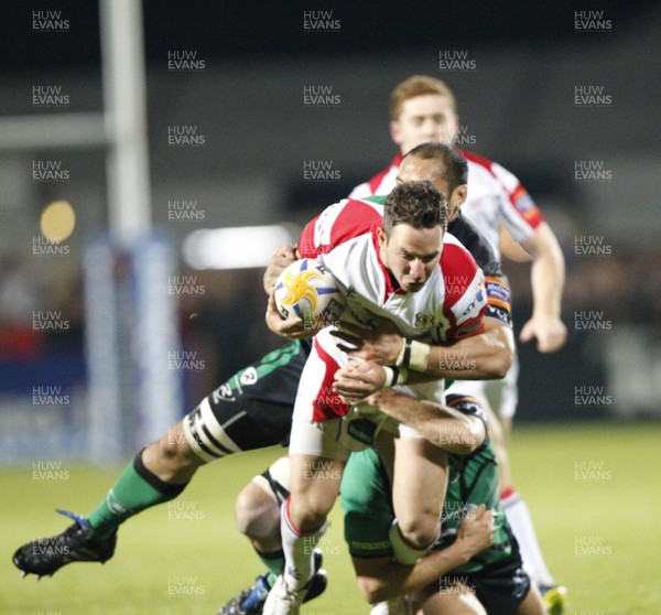 051012 Ulster v Connacht - RaboDirect Pro12 - Paddy Wallace of Ulster is tackled by George Naoupu and Eoin Griffin of Connacht 