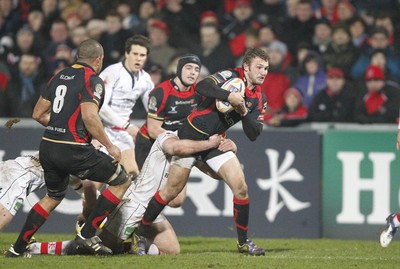 100212 - Ulster v Dragons - RaboDirect Pro 12Dragons' Martyn Thomas is tackled by Ulster's Willie Faloon