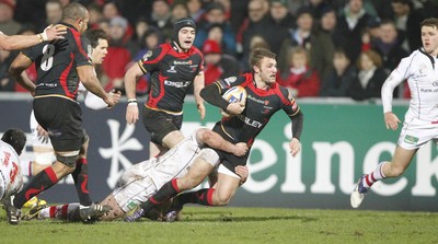 100212 - Ulster v Dragons - RaboDirect Pro 12Dragons' Martyn Thomas is tackled by Ulster's Willie Faloon