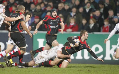 100212 - Ulster v Dragons - RaboDirect Pro 12Dragons' Martyn Thomas is tackled by Ulster's Willie Faloon