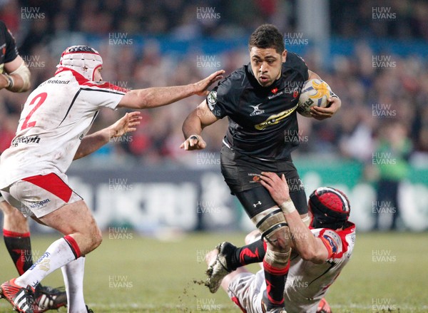 120413 Ulster v Dragons - RaboDirect Pro 12 - Toby Faletau of Dragons is tackled by Rory Best and Dan Tuohy of Ulster 