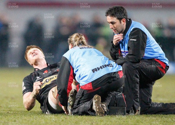 120413 Ulster v Dragons - RaboDirect Pro 12 - Andrew Coombs of Dragons goes down clutching his ankle 