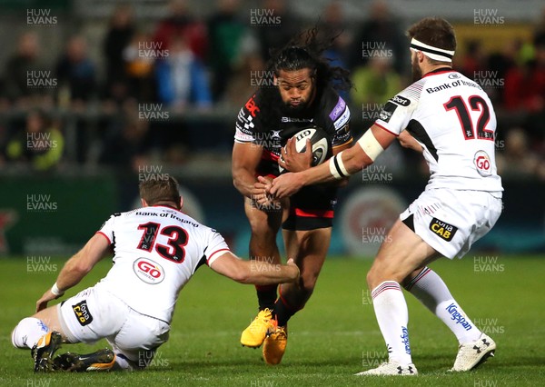 220917 - Ulster v Dragons - Guinness PRO14 - Dragons Thretton Palamo tackled by Ulster Darren Cave and Stuart McCloskey
