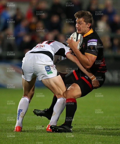 220917 - Ulster v Dragons - Guinness PRO14 - Dragons Carl Meyer is tackled by Ulster Jacob Stockdale