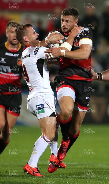 220917 - Ulster v Dragons - Guinness PRO14 - Dragons Dorian Jones is tackled by Ulster  Nick Timoney