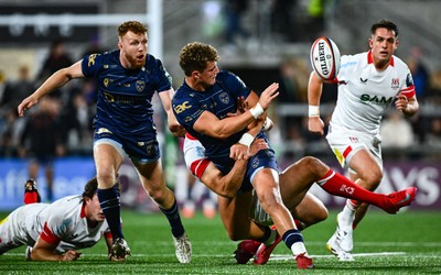 260925 - Ulster v Dragons RFC - United Rugby Championship -  Joe Westwood of Dragons is tackled by Stuart McCloskey of Ulster