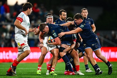 260925 - Ulster v Dragons RFC - United Rugby Championship -  Matthew Screech of Dragons is tackled by Rob Herring of Ulster 