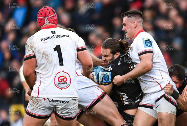 140423 - Ulster v Dragons RFC - United Rugby Championship - Max Clark of Dragons is tackled by Stuart McCloskey, left, and James Hume of Ulster