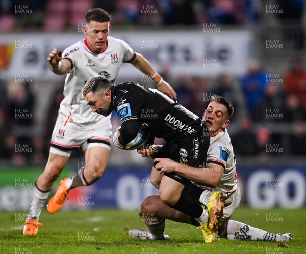 140423 - Ulster v Dragons RFC - United Rugby Championship - Jordan Williams of Dragons is tackled by James Hume of Ulster