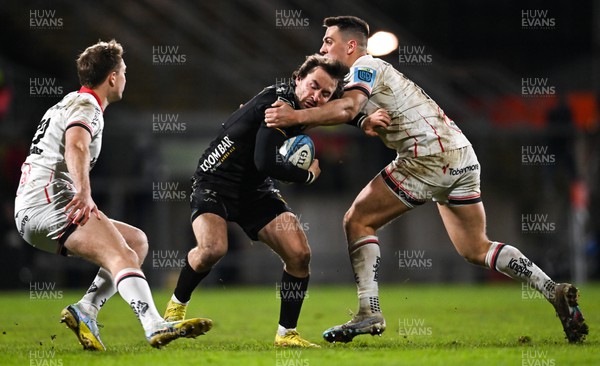 140423 - Ulster v Dragons RFC - United Rugby Championship - Rhodri Williams of Dragons is tackled by James Hume of Ulster
