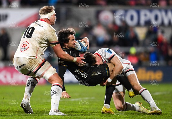 140423 - Ulster v Dragons RFC - United Rugby Championship - Rhodri Williams of Dragons is tackled by Kieran Treadwell, left, and Ethan McIlroy of Ulster