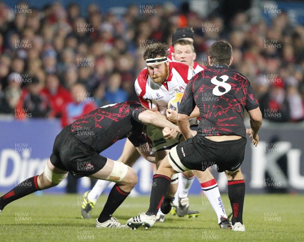 021112 - Ulster v Edinburgh - RaboDirect PRO12 - Neil McComb of Ulster is tackled by Robert McAlpine and Stuart McInally of Edinburgh? Huw Evans Picture Agency