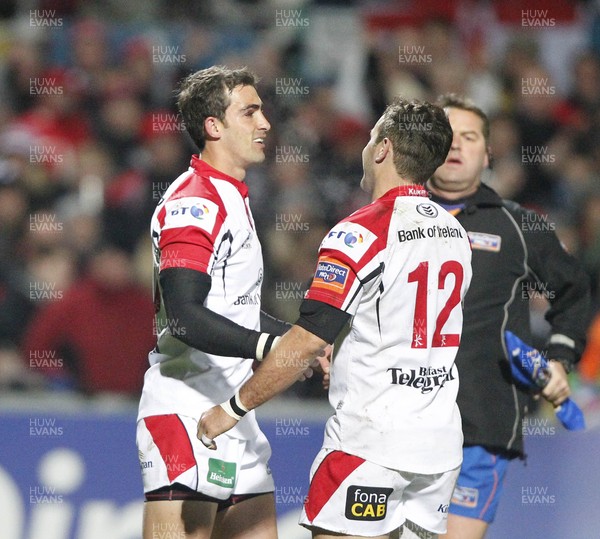 021112 - Ulster v Edinburgh - RaboDirect PRO12 - Ruan Pienaar of Ulster is congratulated by Paddy Wallace? Huw Evans Picture Agency