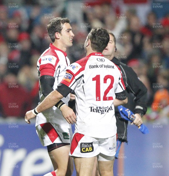 021112 - Ulster v Edinburgh - RaboDirect PRO12 - Ruan Pienaar of Ulster is congratulated by Paddy Wallace? Huw Evans Picture Agency