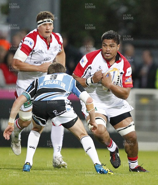 310812 - Ulster v Glasgow Warriors - RaboDirect PRO12 - Nick Williams of Ulster slips the tackle of Glasgow's Henry Pyrgos