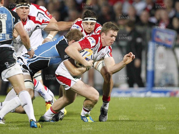 310812 - Ulster v Glasgow Warriors - RaboDirect PRO12 - Chris Farrell of Ulster tackled by John Barclay of Glasgow