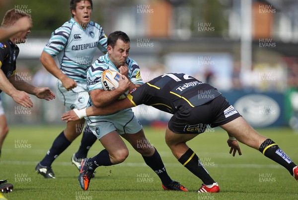 180812 - Ulster v Leicester Tigers - Preseason Friendly - Micky Young of Leicester tackled by Luke Marshall of Ulster  