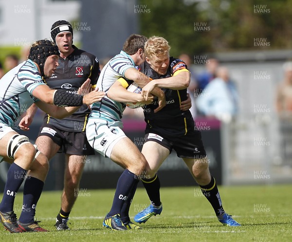 180812 - Ulster v Leicester Tigers - Preseason Friendly - Stuart Olding of Ulster takes the tackle  