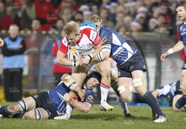 211212 Ulster v Leinster - RaboDirect Pro 12 - Luke Marshall of Ulster is tackled by Shane Jennings and Kevin McLaughlin of Leinster 