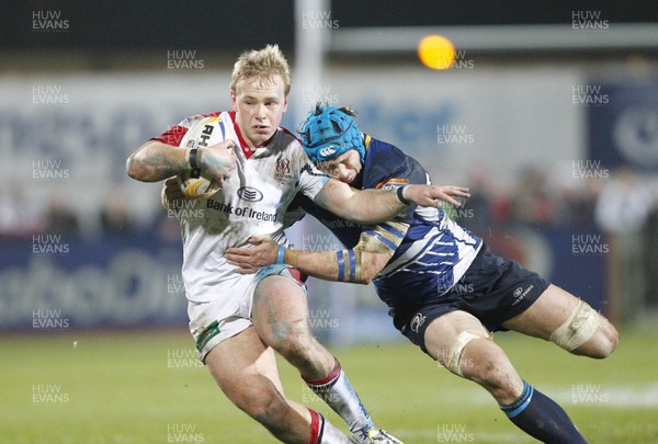 211212 Ulster v Leinster - RaboDirect Pro 12 - Luke Marshall of Ulster is tackled by Kevin McLaughlin of Leinster 