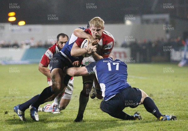 211212 Ulster v Leinster - RaboDirect Pro 12 - Chris Henry of Ulster is tackled by Isaac Boss and Heinke van der Merwe of Leinster 