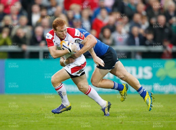 230813 - Ulster v Leinster - Pre-season Friendly - Roy Scholes of Ulster is tackled by  Darren Hudson of Leinster 