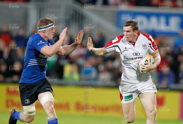 230813 - Ulster v Leinster - Pre-season Friendly - Chris Farrell of Ulster takes on Jordi Murphy of Leinster 