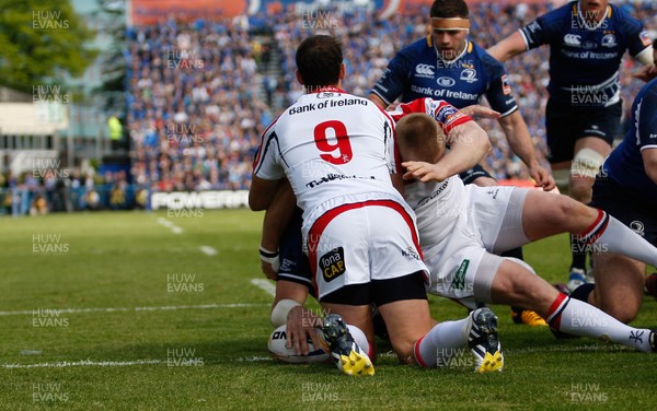 250513 - Ulster v Leinster - RaboDirect Pro 12 - Shane Jennings goes over to score the first try for Leinster despite the tackle of Ulster's Ruan Pienaar 