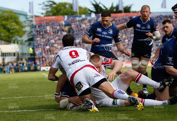 250513 - Ulster v Leinster - RaboDirect Pro 12 - Shane Jennings goes over to score the first try for Leinster despite the tackle of Ulster's Ruan Pienaar 