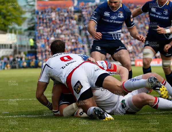 250513 - Ulster v Leinster - RaboDirect Pro 12 - Shane Jennings goes over to score the first try for Leinster despite the tackle of Ulster's Ruan Pienaar 