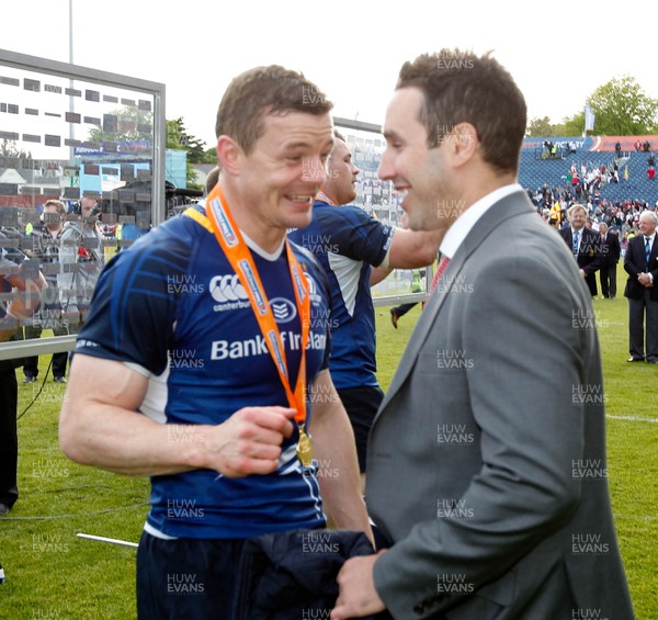 250513 - Ulster v Leinster - RaboDirect Pro 12 - Brian O'Driscoll of Leinster shares a joke with an injured Paddy Wallace of Ulster 